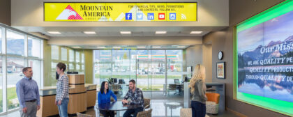 Modern bank design uses welcoming, open concept layouts and intelligent display solutions to drive experience and objectives.