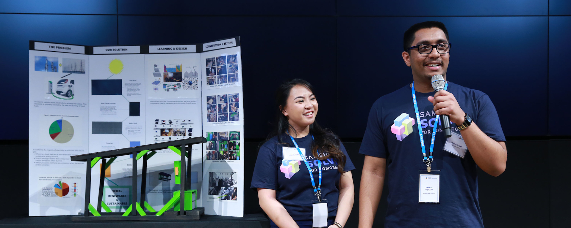 Shaneel Narayan and Jashene Tongco of Mission Valley ROP/James Logan High School of Fremont, CA, present solar powered charging station for electric vehicles at the Samsung Solve for Tomorrow Finalist Pitch Event on Tuesday, March 15, 2016 in New York.