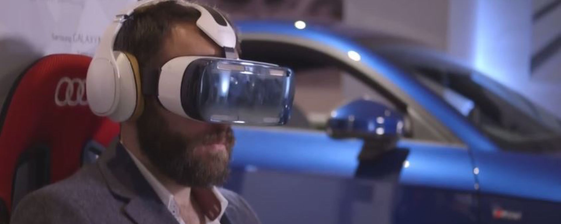 A customer visits the Audio showroom to experience a fully immersive virtual reality test drive and 360° tours of the new third generation Audi TT using the Samsung Gear VR.