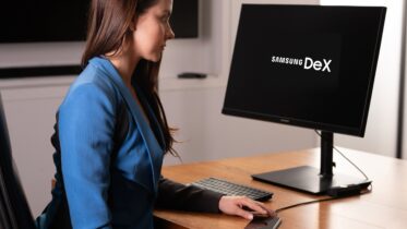 Woman studying at home using Samsung DeX