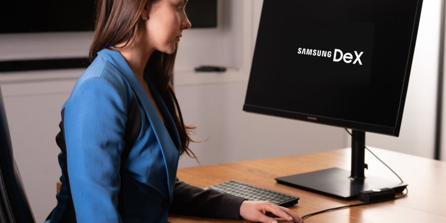 Woman studying at home using Samsung DeX