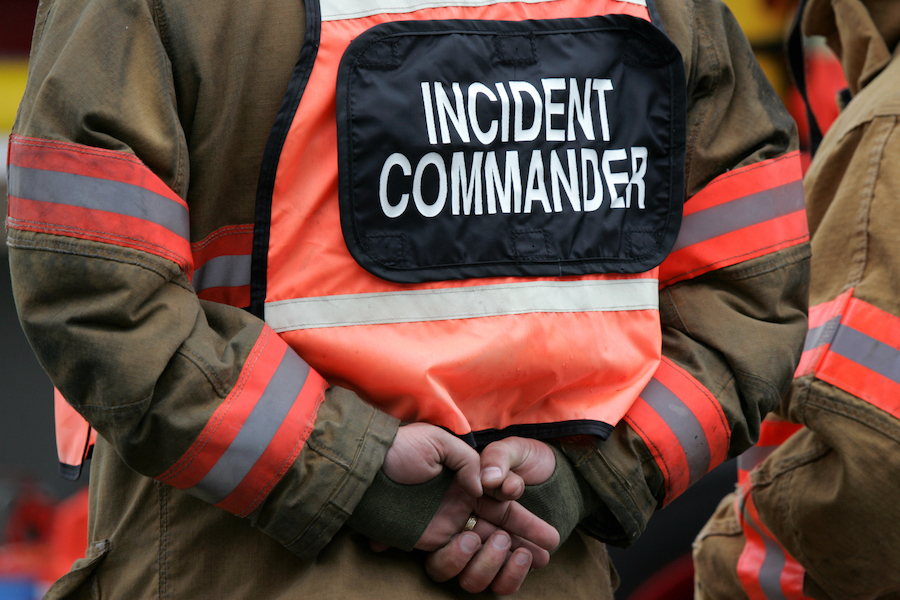 An incident commander in uniform on the job