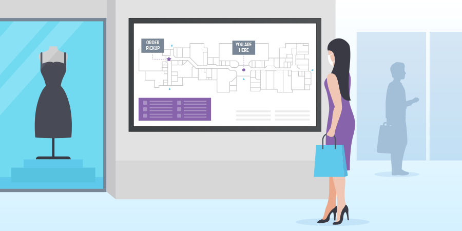 Masked shopper surveys mall map on large display