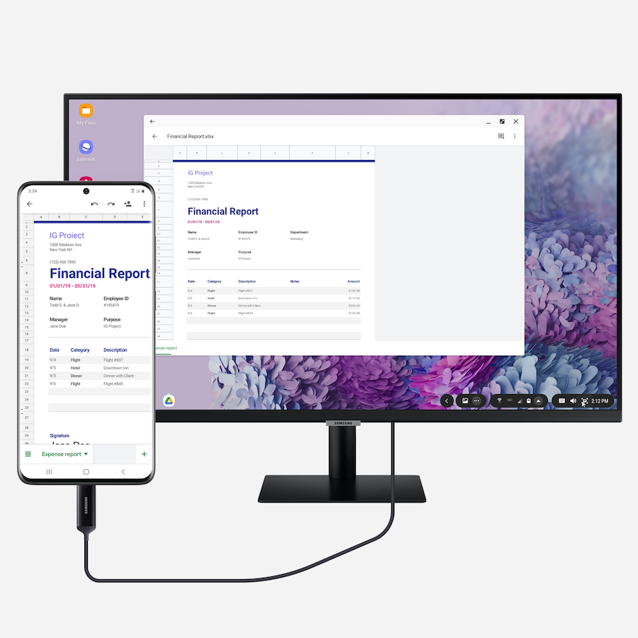 A Galaxy smartphone connected to a desktop monitor with Samsung DeX