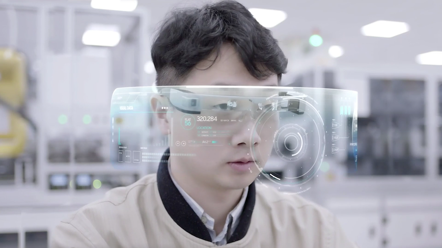 Worker at Samsung factory in Suwon, Korea views data projected on 5G-connected eyepiece