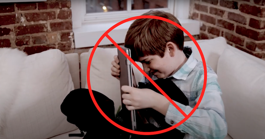 Student stuffing Chromebook into backpack, with prohibition symbol overlay