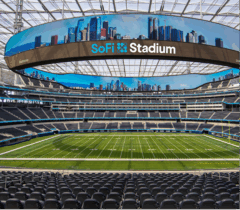 At SoFi Stadium in Los Angeles, a circular LED screen hangs above the football field.