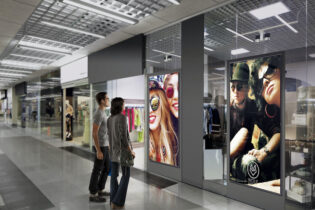 Social media UGC content on retail signage inside mall