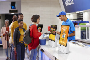 Self-service kiosk at stadium concessions stand.