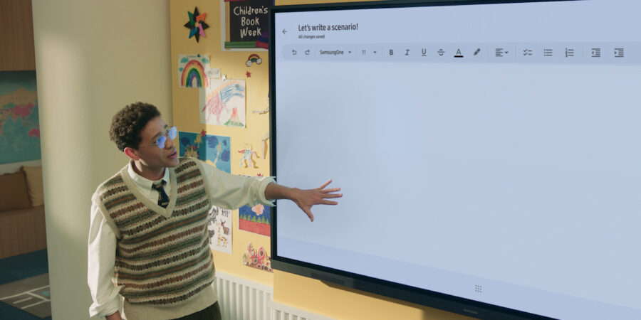 Teacher using Samsung interactive whiteboard to enhance lessons