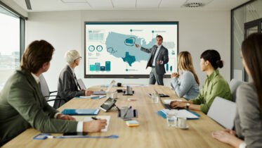 The modern meeting room display: Smarter collaboration, lower costs